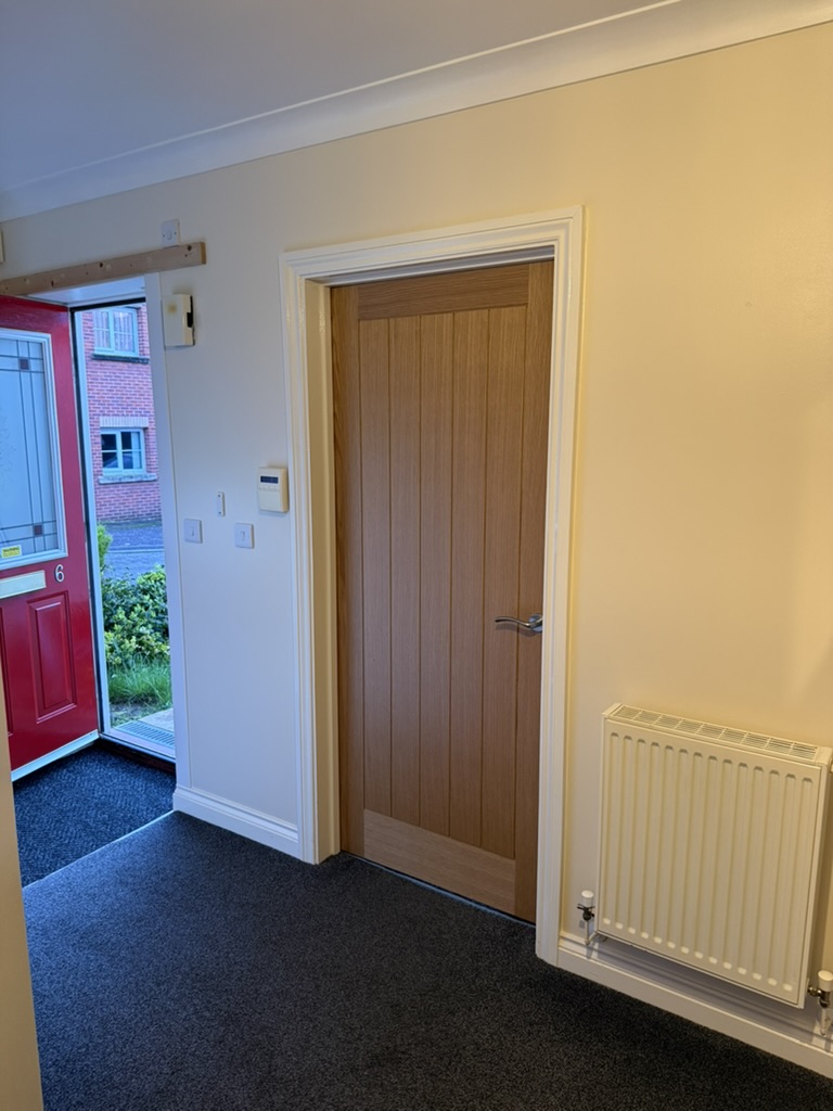 Newly hung oak internal door